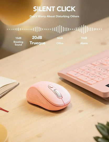 Pink wireless silent click mouse and matching keyboard on a wooden desk, ideal for quiet gaming setups.