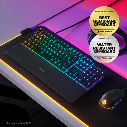 RGB gaming keyboard with wrist rest, mouse, and headset on illuminated desk, Byte Style