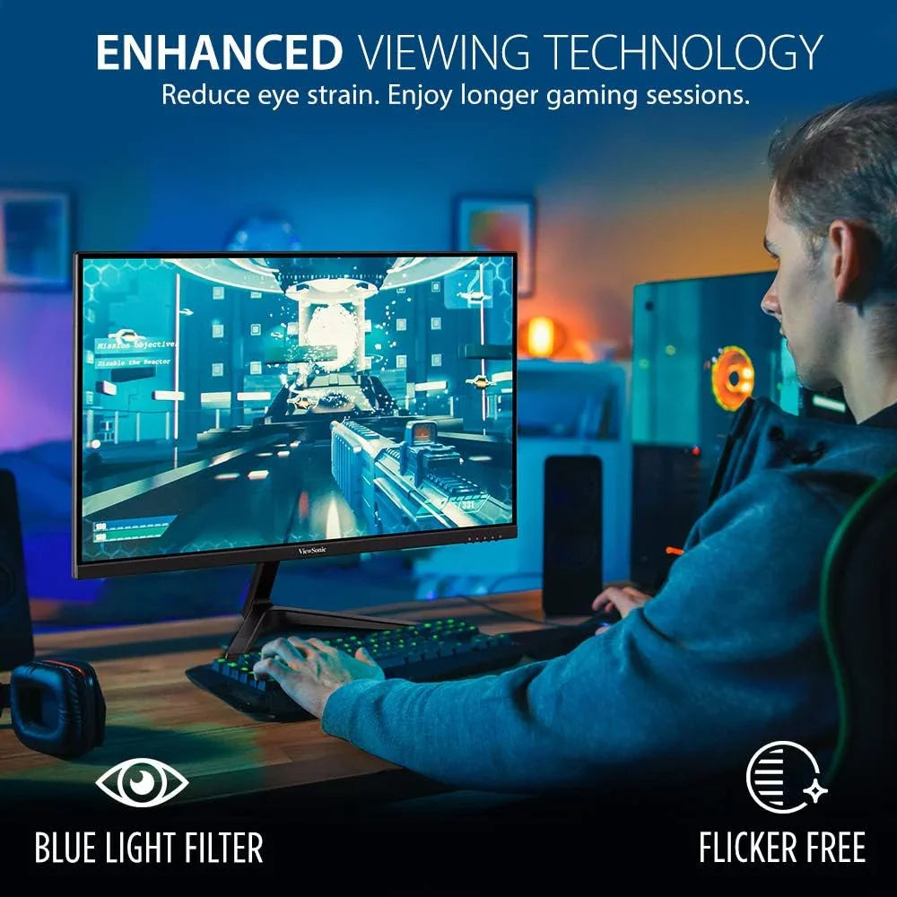Gamer using a desktop setup with enhanced viewing technology monitor featuring blue light filter and flicker-free display