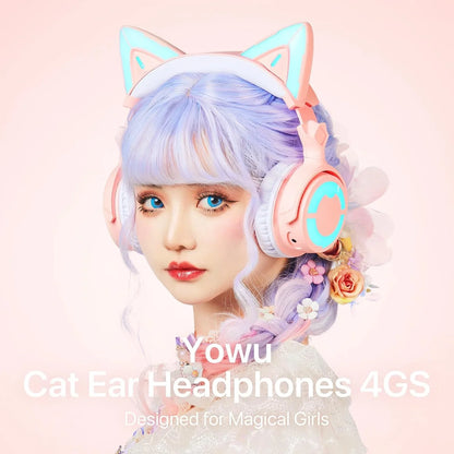 Young woman with pastel purple hair wearing pink and blue cat ear headphones, floral accessories, and lace outfit