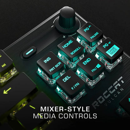 Close-up of Roccat Vulcan gaming keyboard with RGB backlit keys and mixer-style media controls.