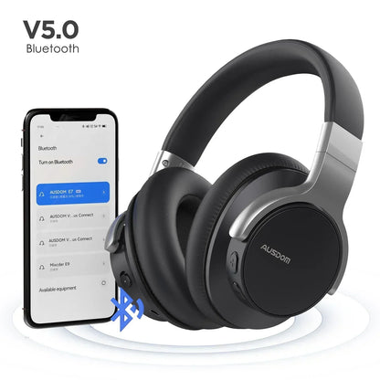 Black wireless Bluetooth headphones next to smartphone, V5.0 connectivity, gaming gear