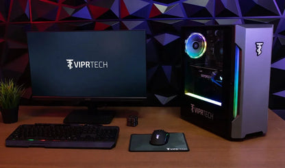 VIPRTECH gaming desktop with RGB lighting, monitor, mechanical keyboard, and mouse on wooden desk