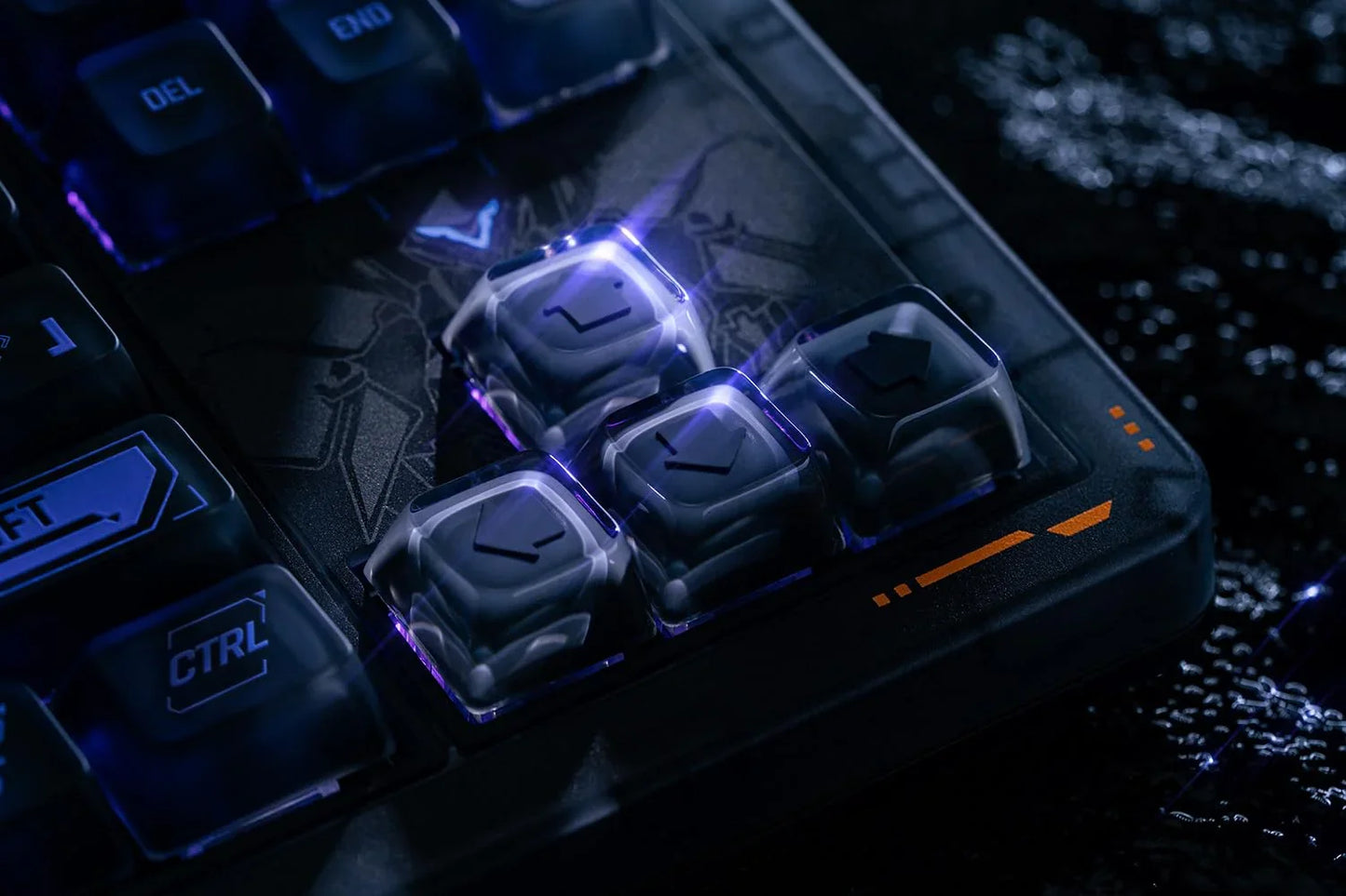 Close-up of illuminated mechanical gaming keyboard with translucent arrow keycaps