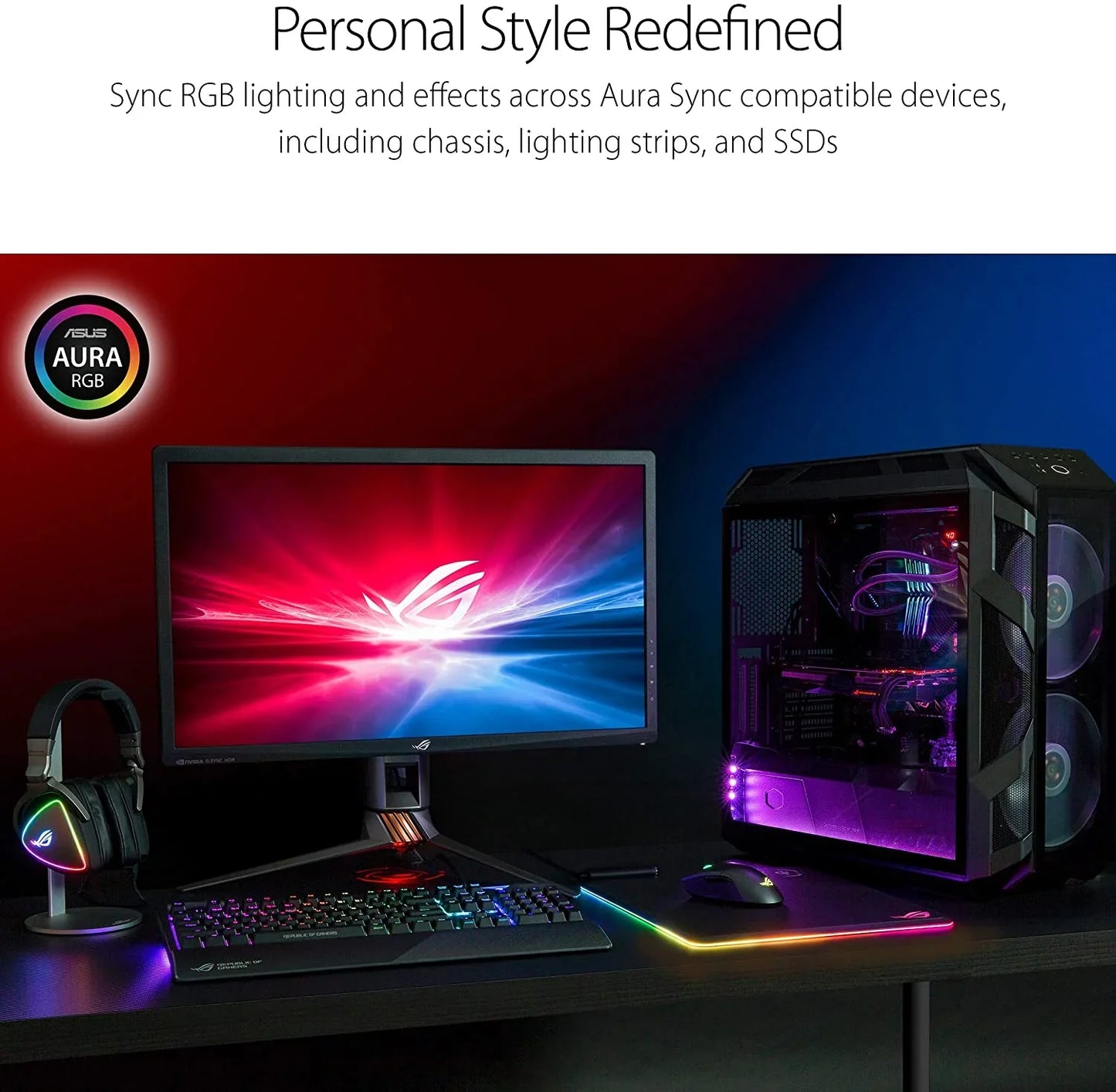 Gaming setup with ASUS Aura RGB desktop PC, monitor, mechanical keyboard, RGB mouse, and headset on black desk