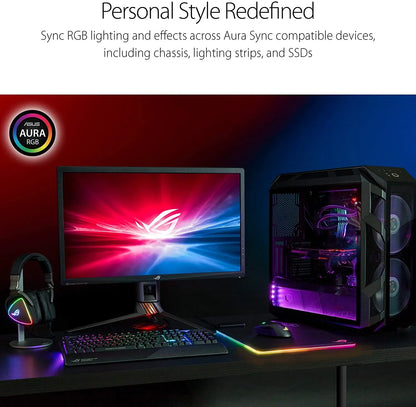 Gaming setup with ASUS Aura RGB desktop PC, monitor, mechanical keyboard, RGB mouse, and headset on black desk