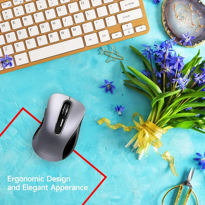 Wireless ergonomic computer mouse with keyboard and purple flowers on blue desk
