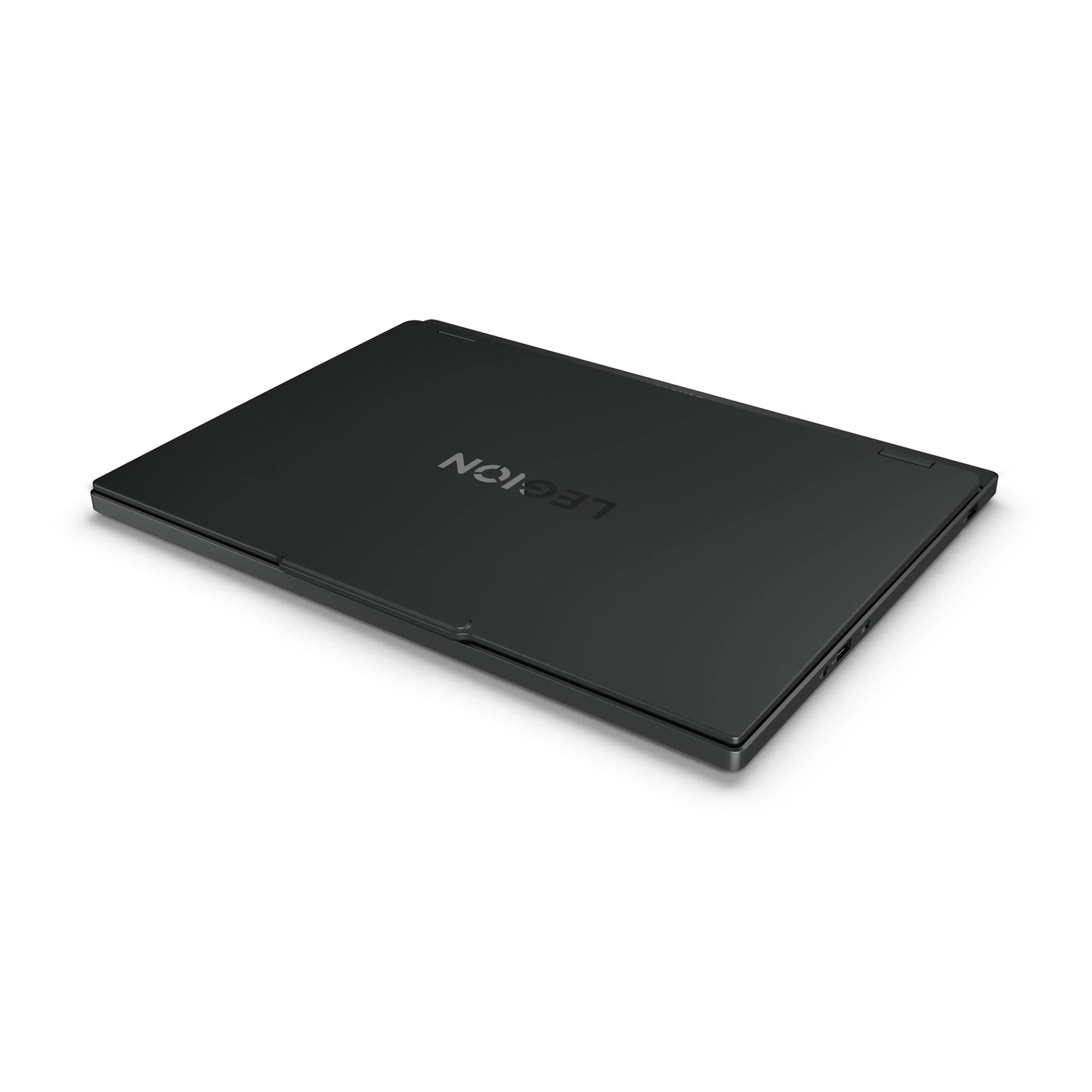 Closed black gaming laptop with sleek design and subtle logo on white background