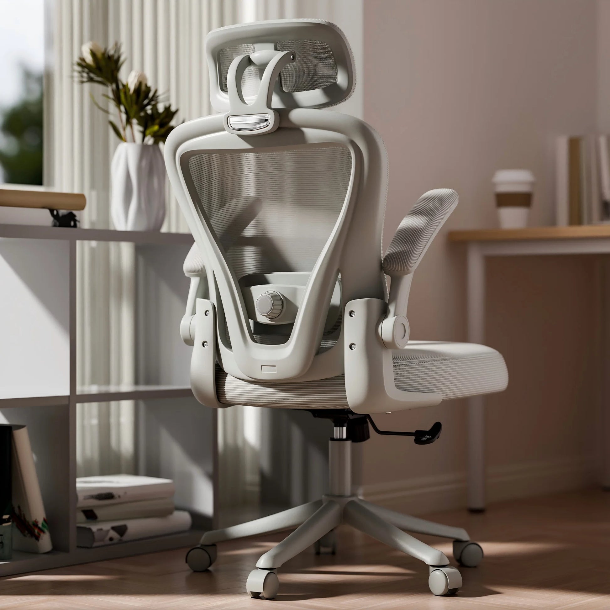 Ergonomic mesh office chair with headrest, adjustable arms, and lumbar support for gaming or work setup
