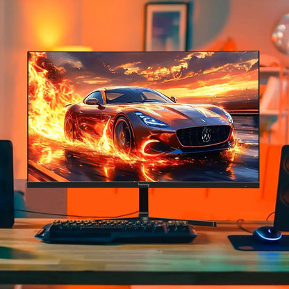 Curved gaming monitor on desk displaying fiery sports car in dynamic racing scene with RGB keyboard and mouse