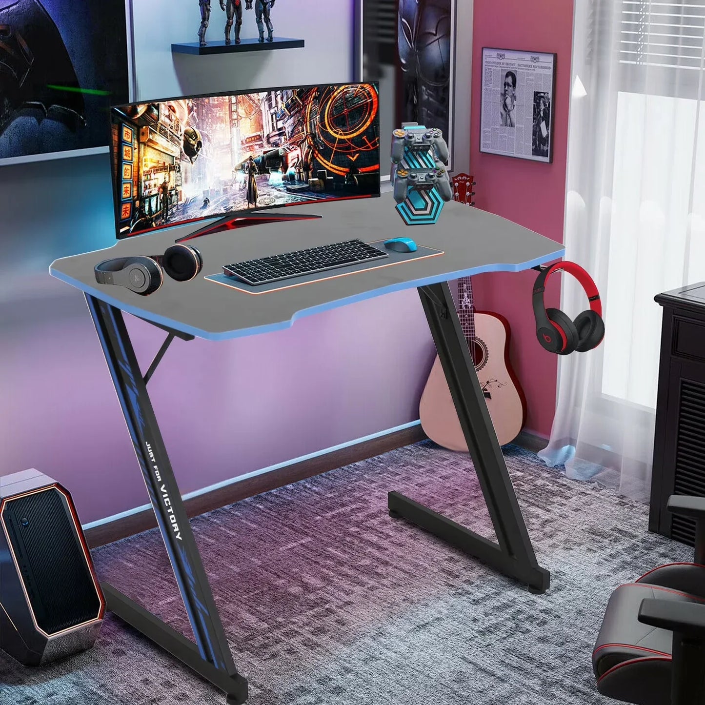 Modern gaming desk setup with curved monitor, keyboard, mouse, headphones, and guitar in corner