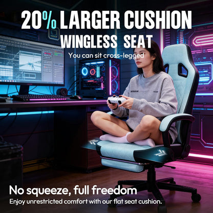 Gamer sitting cross-legged on wingless gaming chair with 20% larger cushion, holding controller in neon-lit setup