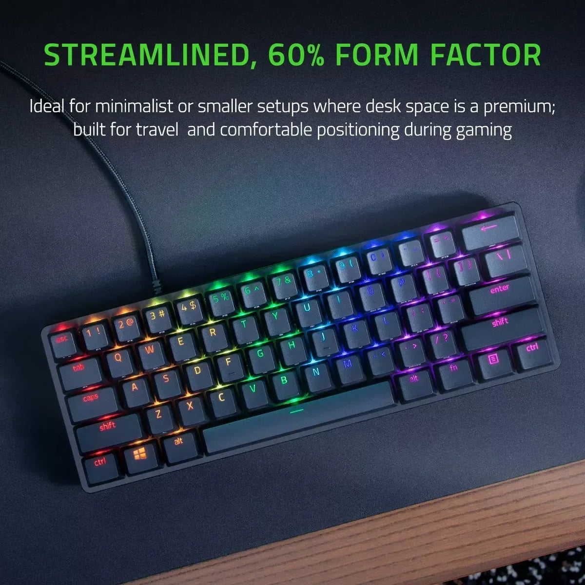 Compact RGB 60% gaming keyboard on a desk, ideal for minimalist modern gaming setups