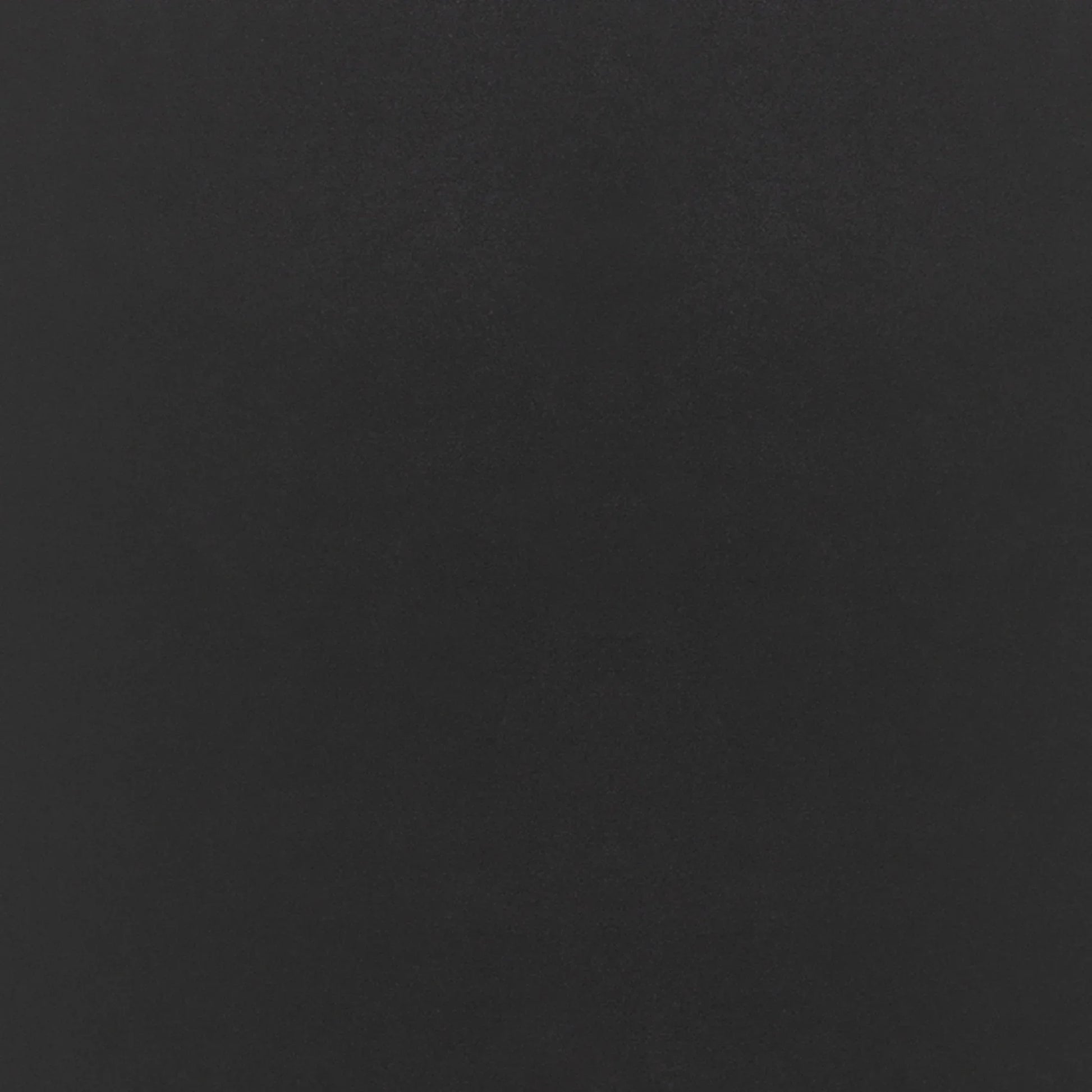 Close-up of black leather upholstery with detailed horizontal stitching pattern