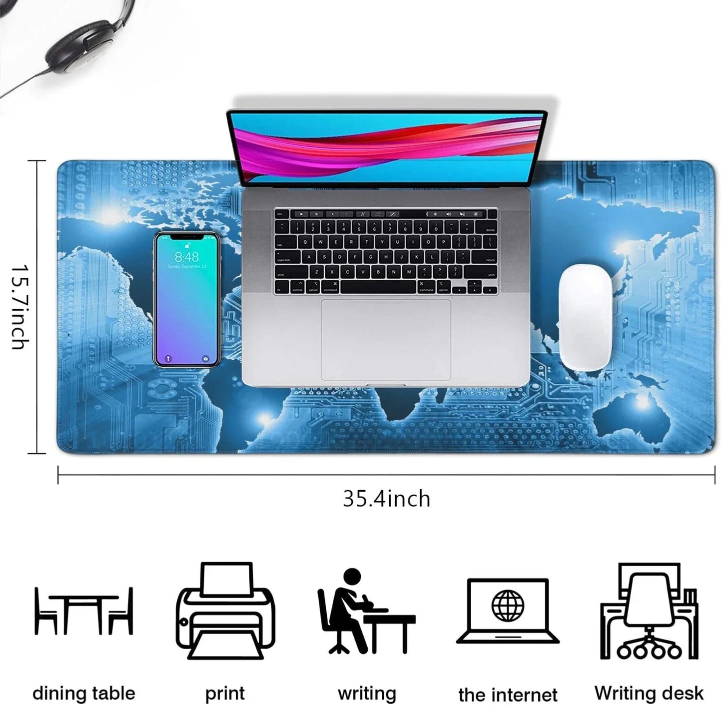 Large blue gaming desk mat with world map and circuit design holding laptop, phone, mouse, and headphones