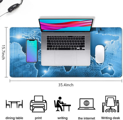 Large blue gaming desk mat with world map and circuit design holding laptop, phone, mouse, and headphones