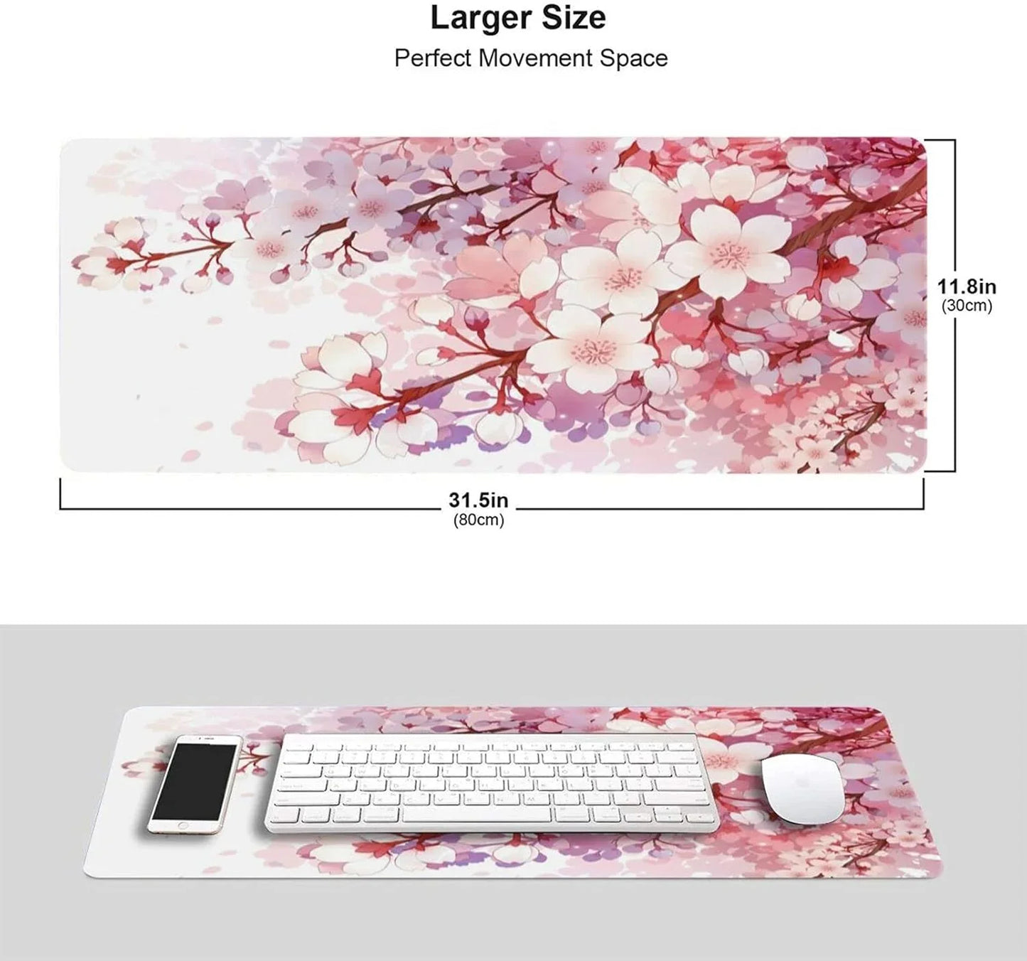 Large rectangular gaming desk mat with pink and white cherry blossom design, keyboard, mouse, and phone on top