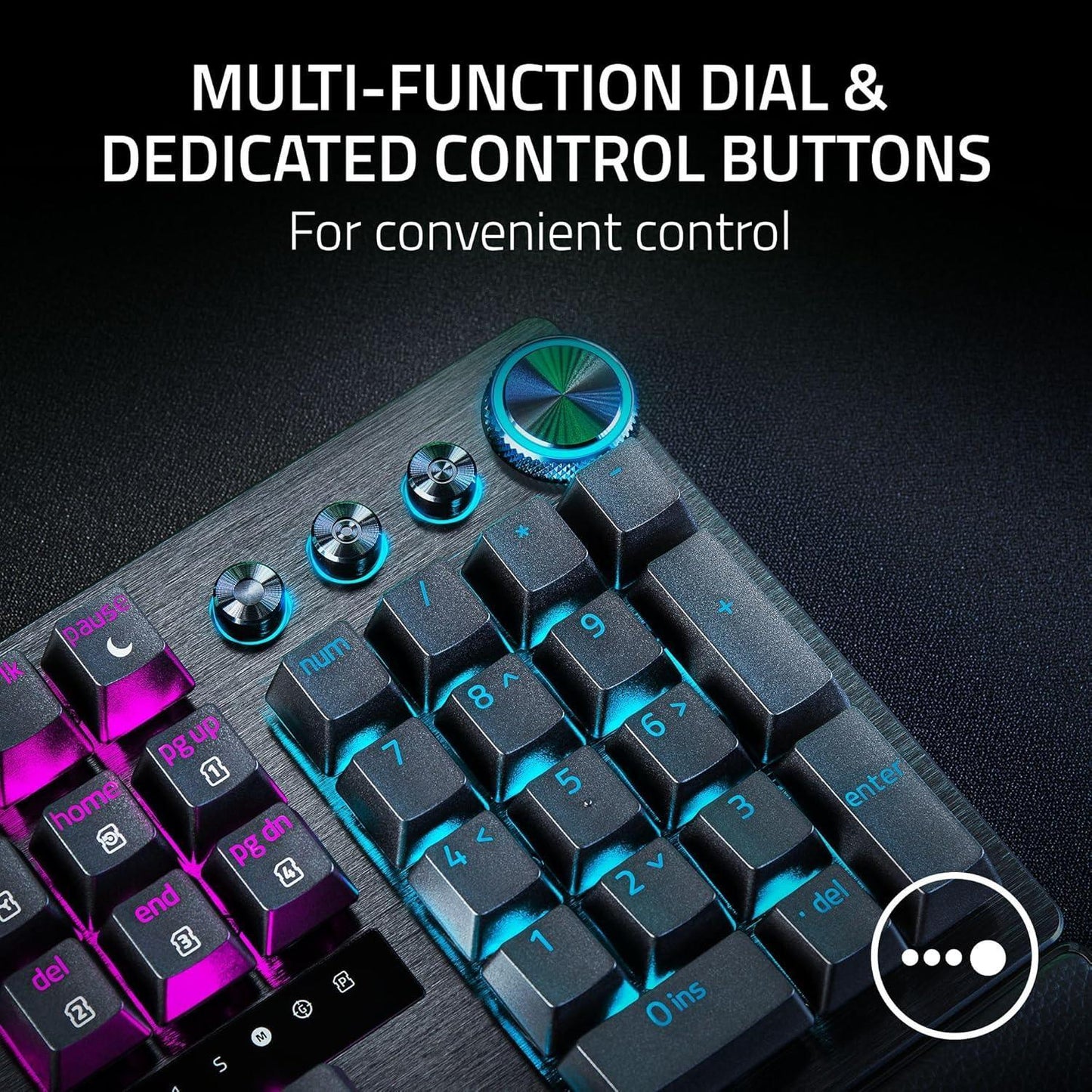 RGB mechanical gaming keyboard with multi-function dial and control buttons on dark surface