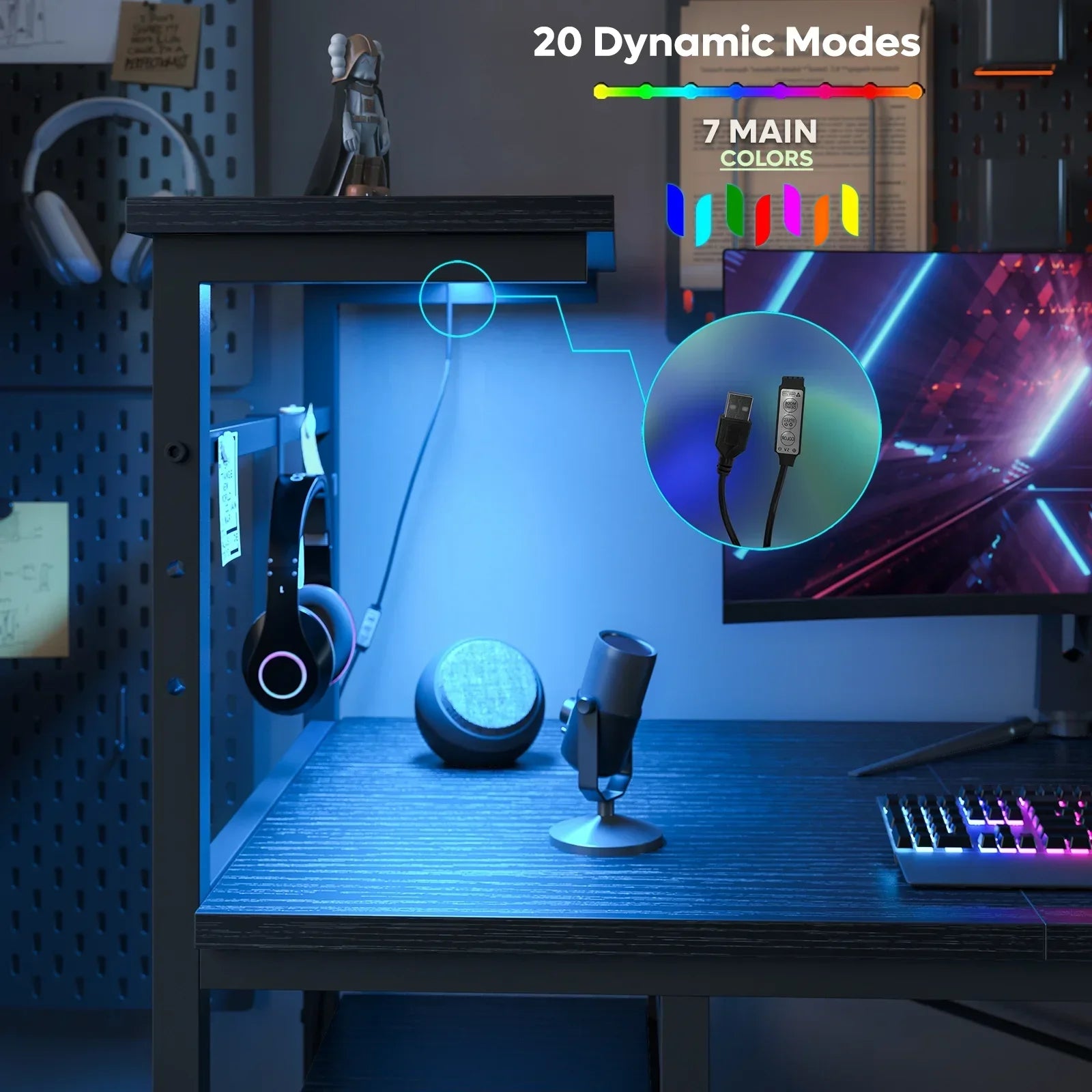 Modern gaming desk setup with RGB lighting, headphones, desktop mic, and a colorful keyboard
