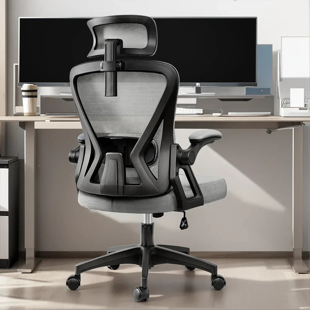Ergonomic gaming chair with mesh back, adjustable arms, and headrest for desk setup comfort