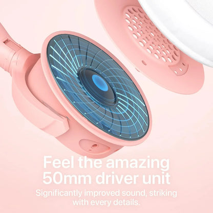 Close-up of pink gaming headphones driver unit with 50mm speaker and ventilation holes, showcasing sound technology