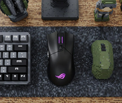 Black gaming mouse with purple LED, pixel art keyboard and desk, 8-bit style setup