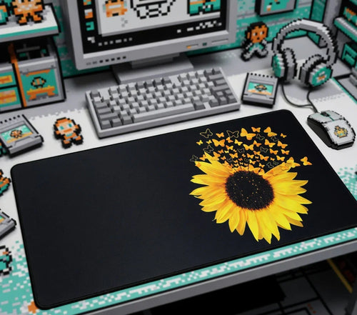 Large sunflower and butterfly print gaming mouse pad on retro 8-bit computer desk setup