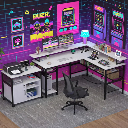 Modern gaming setup with L-shaped desk, dual monitors, 8-bit pixel art wall decor, and accessories.