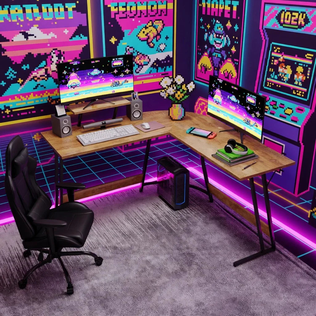 Retro gaming setup with dual monitors, 8-bit wall art, RGB lights, and gaming chair