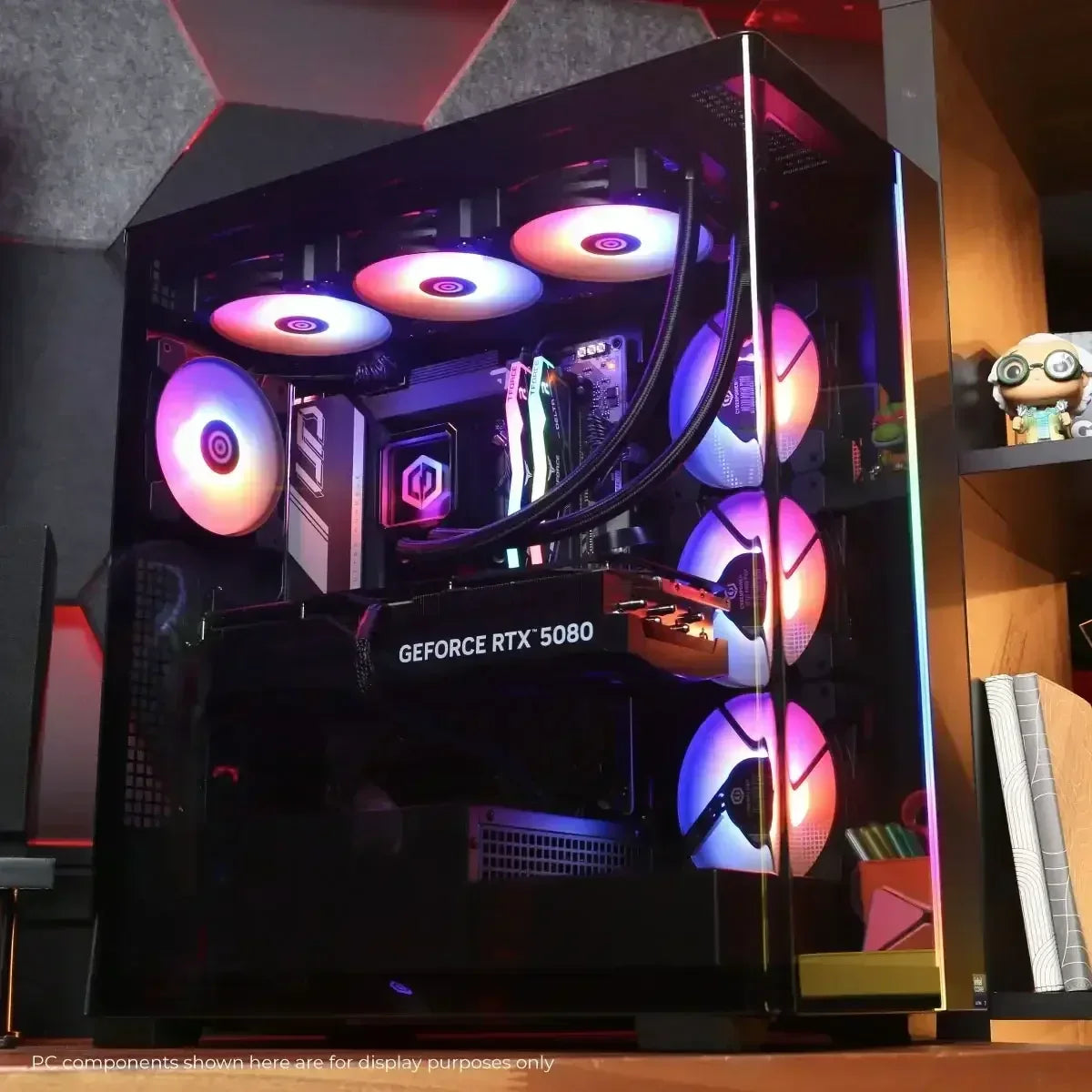 Gaming PC with RGB cooling fans and GeForce RTX 5080 graphics card in transparent case