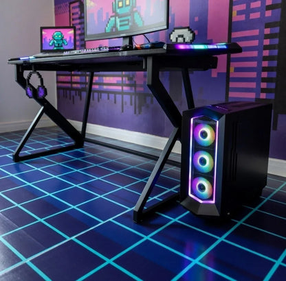 Retro gaming setup with RGB keyboard, mouse, desktop PC, and 8-bit robot wall art