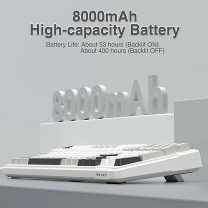 White 99-key gaming keyboard with 8000mAh high-capacity battery on minimalist desk.
