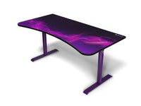Curved gaming desk with purple cosmic nebula design and sturdy purple metal legs on white background