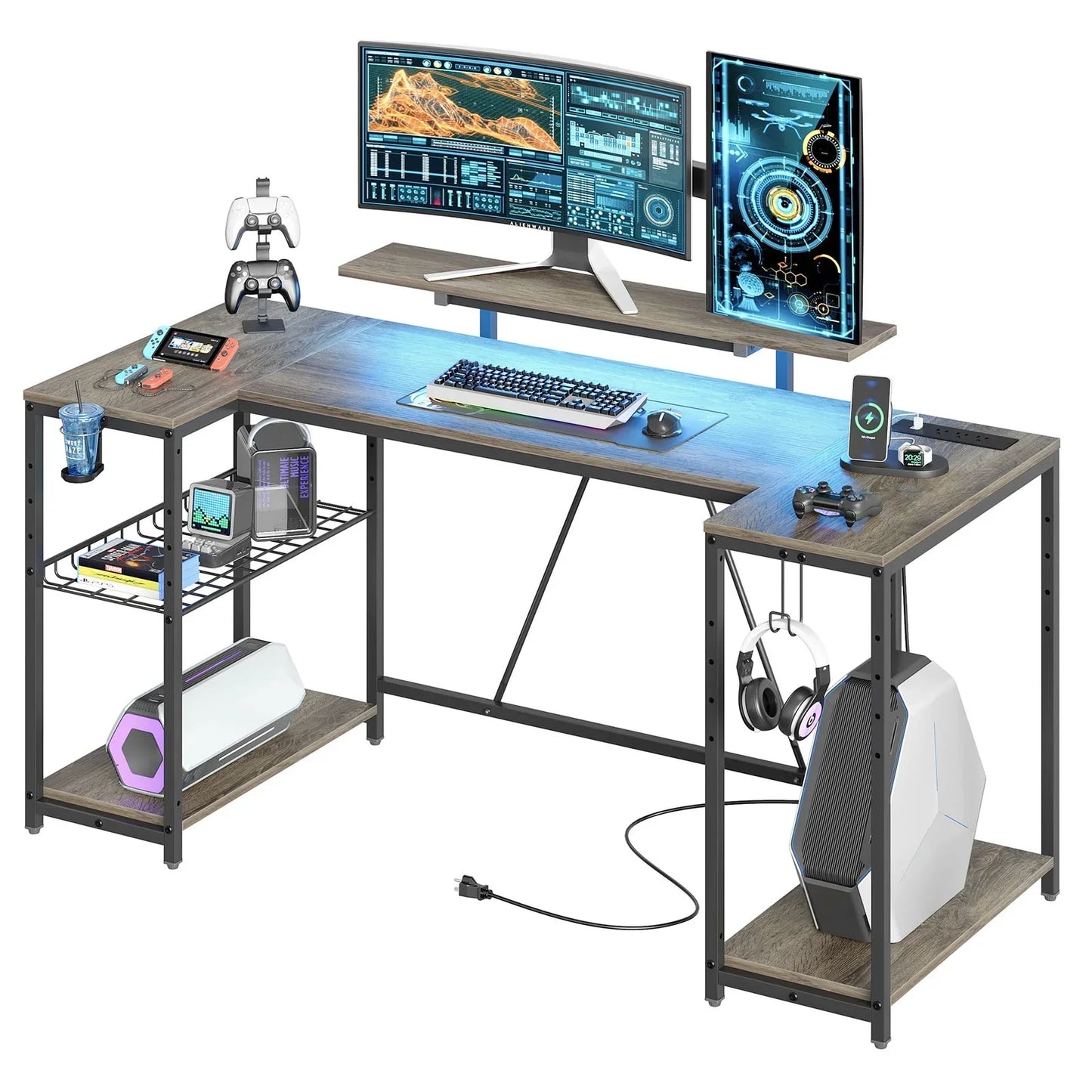 L-shaped gaming desk with dual monitors, keyboard, gaming controllers, PC tower, and storage shelves