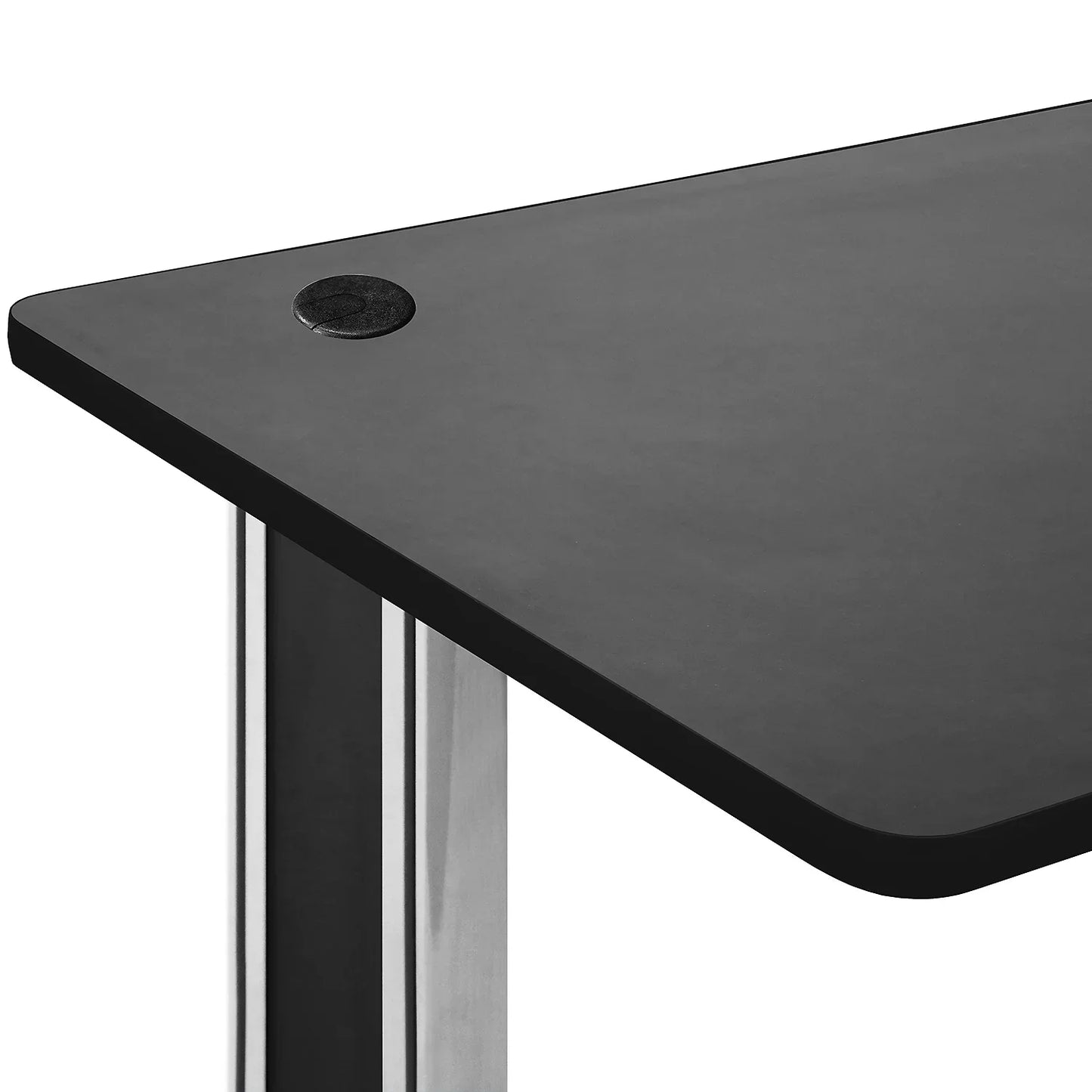 Close-up of black standing desk with rounded corner and polished metal legs