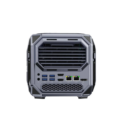 Compact gaming PC rear view showing USB ports, HDMI, audio jack, LAN, and cooling vents