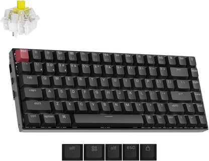 Mechanical gaming keyboard with black keycaps, red escape key, yellow switch, and modifier keys
