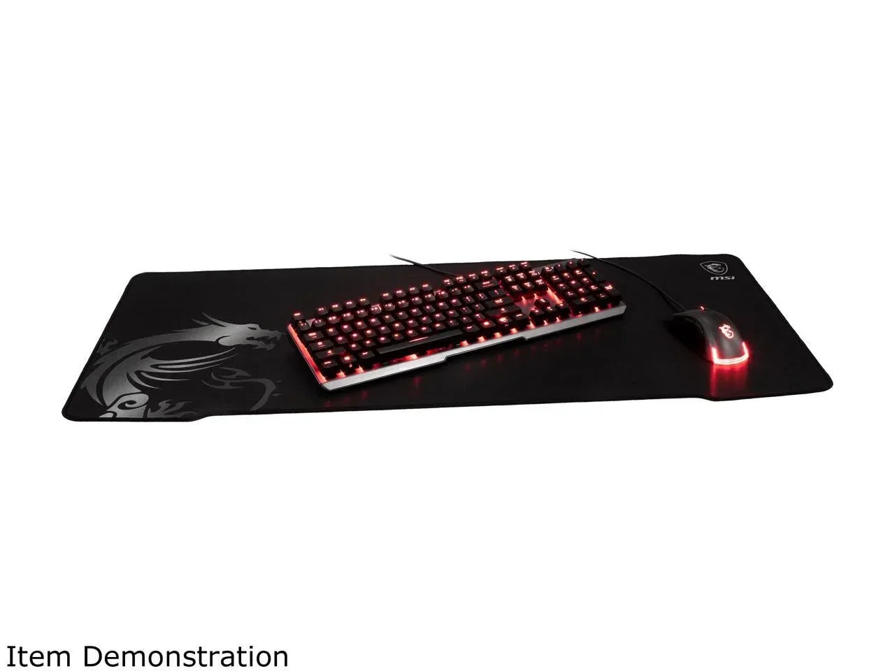 Gaming keyboard and mouse with red RGB lighting on large black MSI dragon-logo mouse pad
