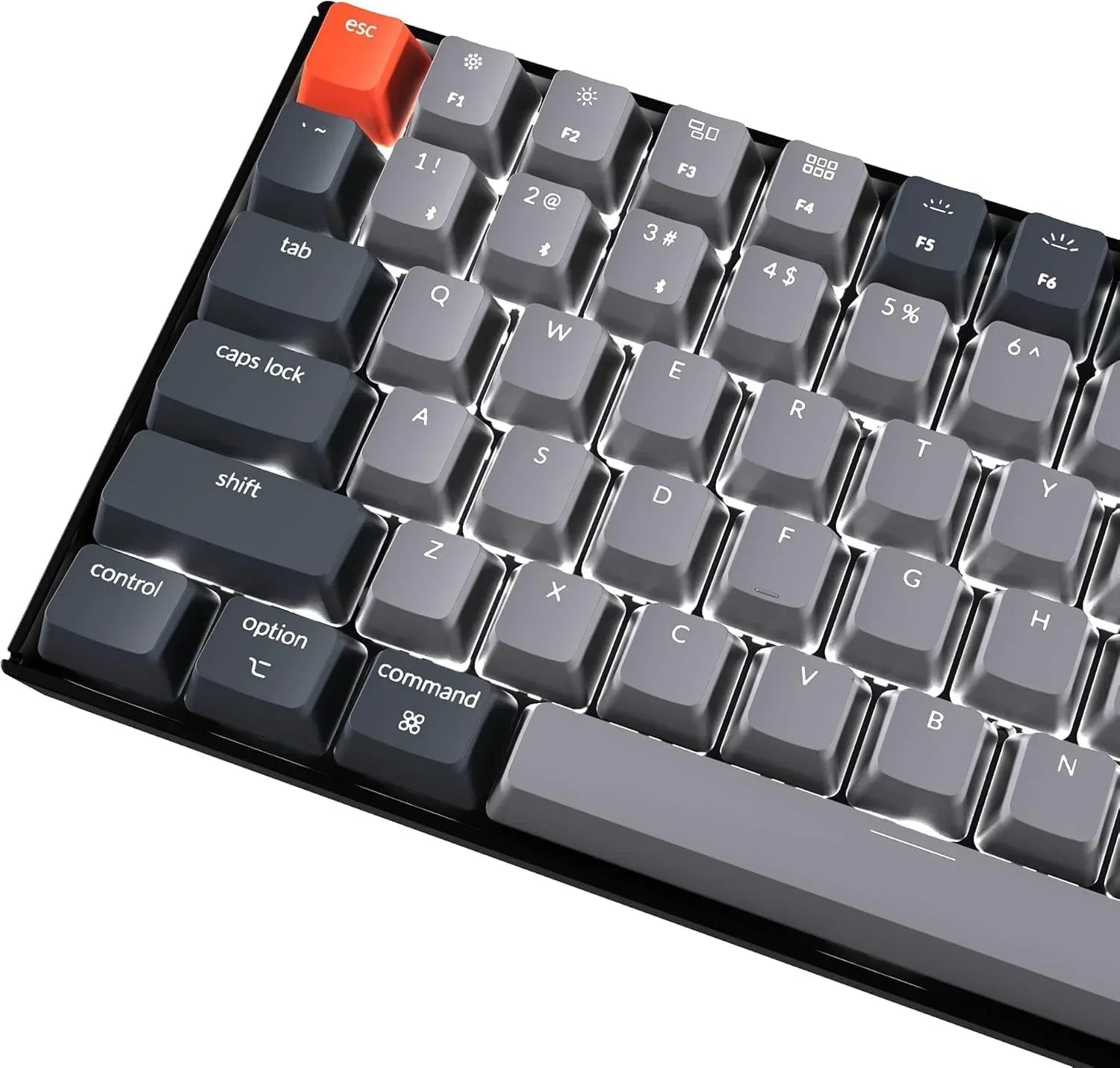 Retro 8-bit style RGB gaming keyboard by Byte Style with gray and orange keycaps