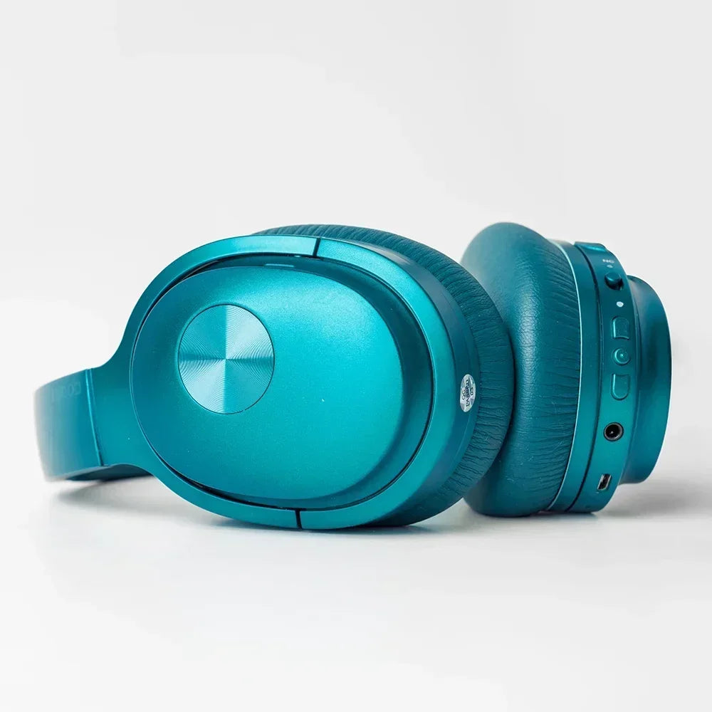 Teal over-ear wireless gaming headset with cushioned ear cups on a white background