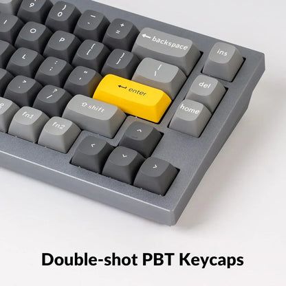 Gray mechanical keyboard with yellow enter key, double-shot PBT keycaps, Byte Style gaming gear