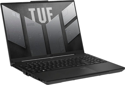 Black gaming laptop with TUF branding on screen, angled view, backlit keyboard visible