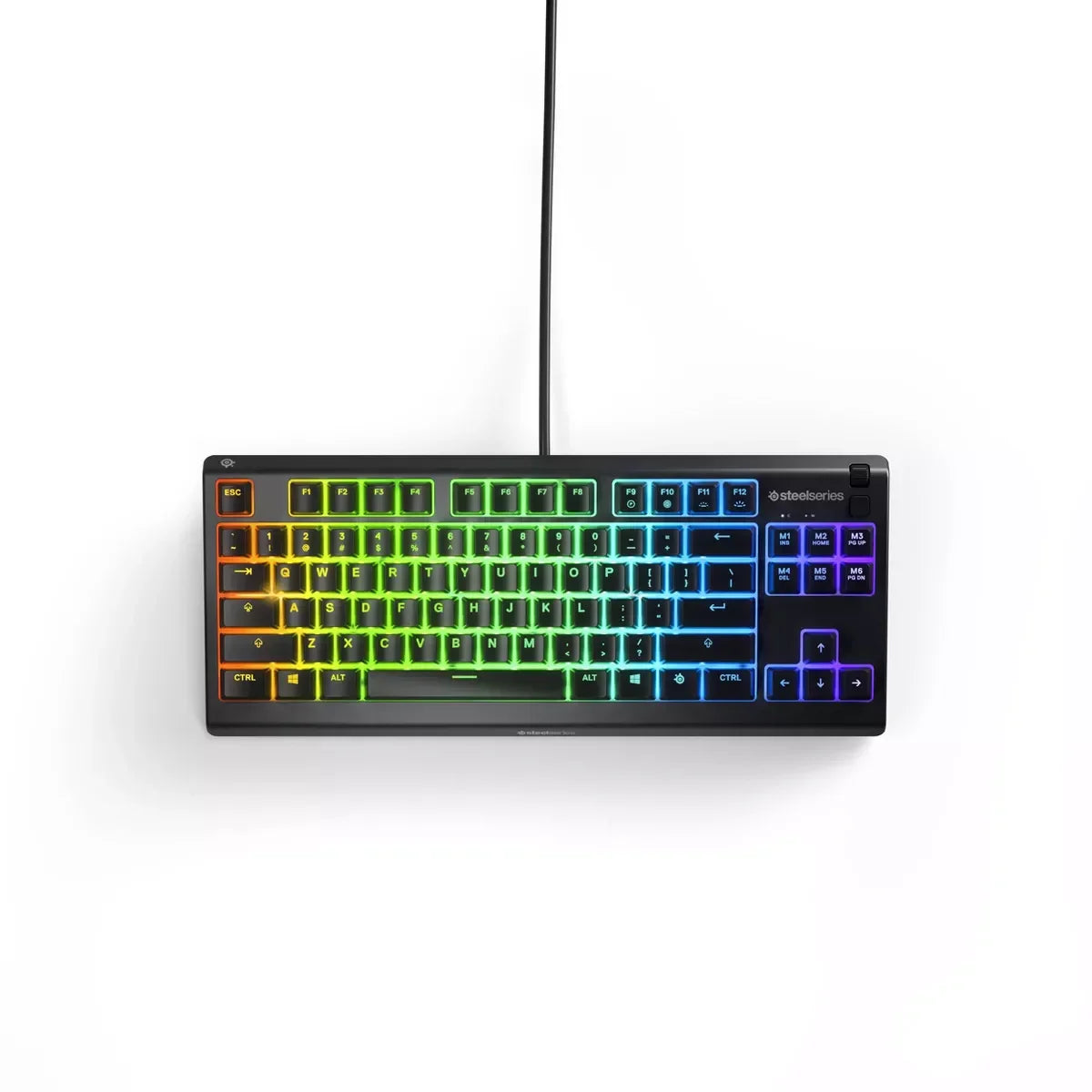 SteelSeries wired gaming keyboard with vibrant RGB backlit keys in rainbow colors, compact design
