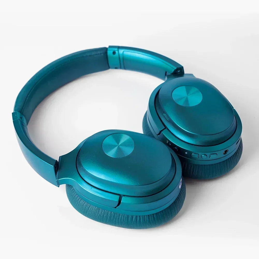 Teal wireless over-ear gaming headphones with padded ear cups on a white background
