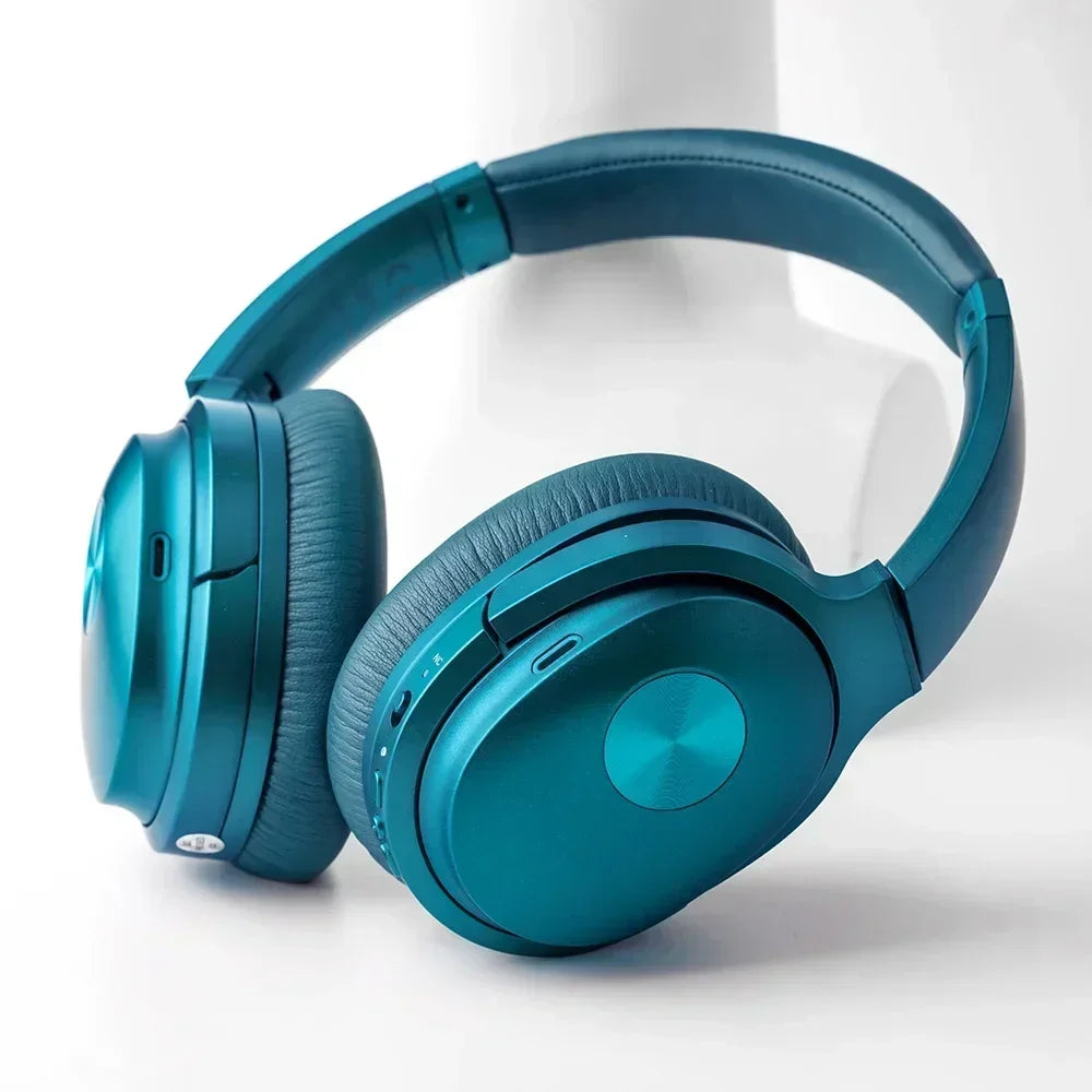 Teal over-ear wireless gaming headset with cushioned ear cups on a white background