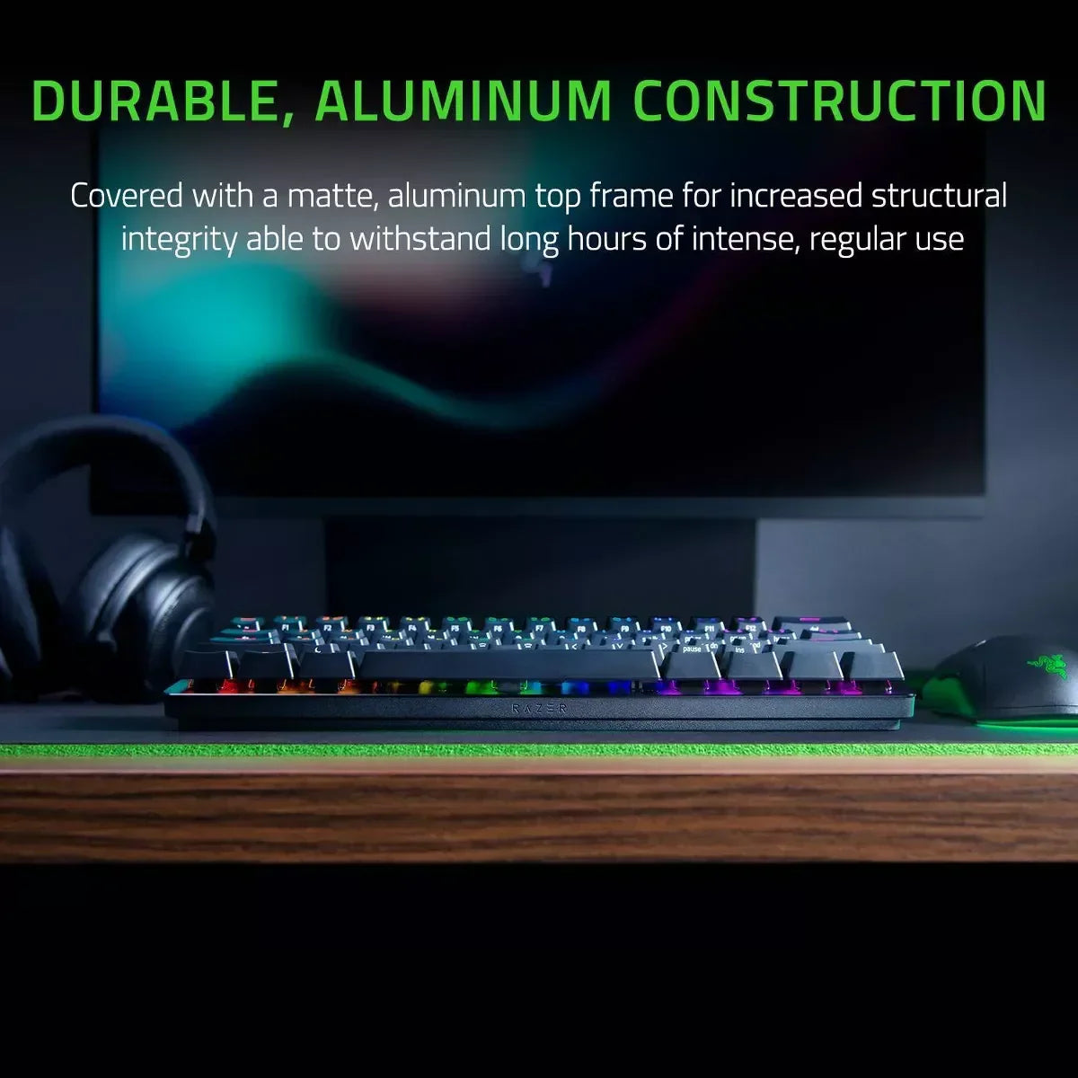 RGB gaming keyboard with aluminum frame on desk, monitor and headset in background, Byte Style