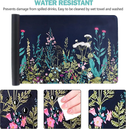 Water-resistant gaming mouse pad with wildflower design on navy background, shown with water droplets and easy cleaning
