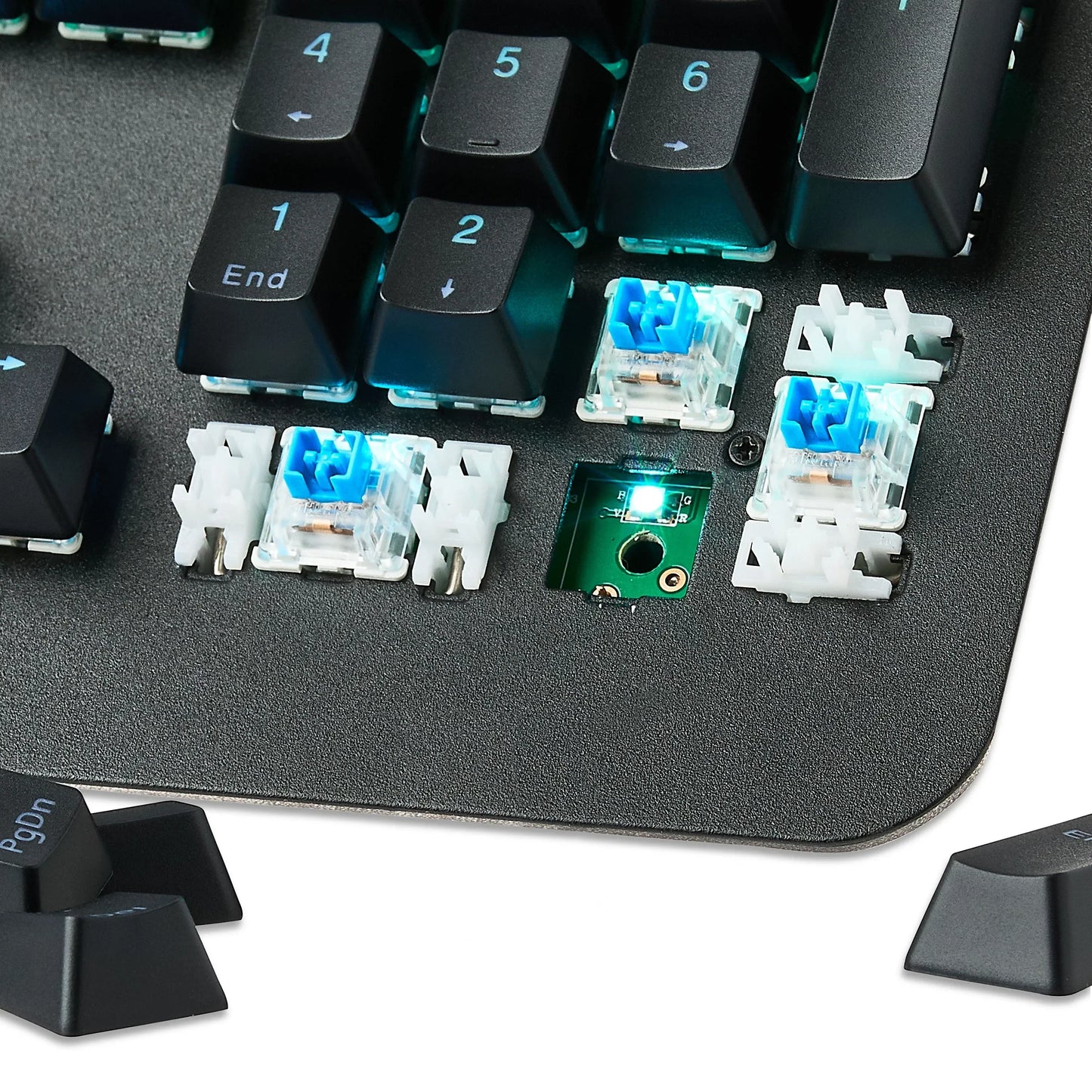 Close-up of mechanical gaming keyboard with blue switches and RGB LED lighting