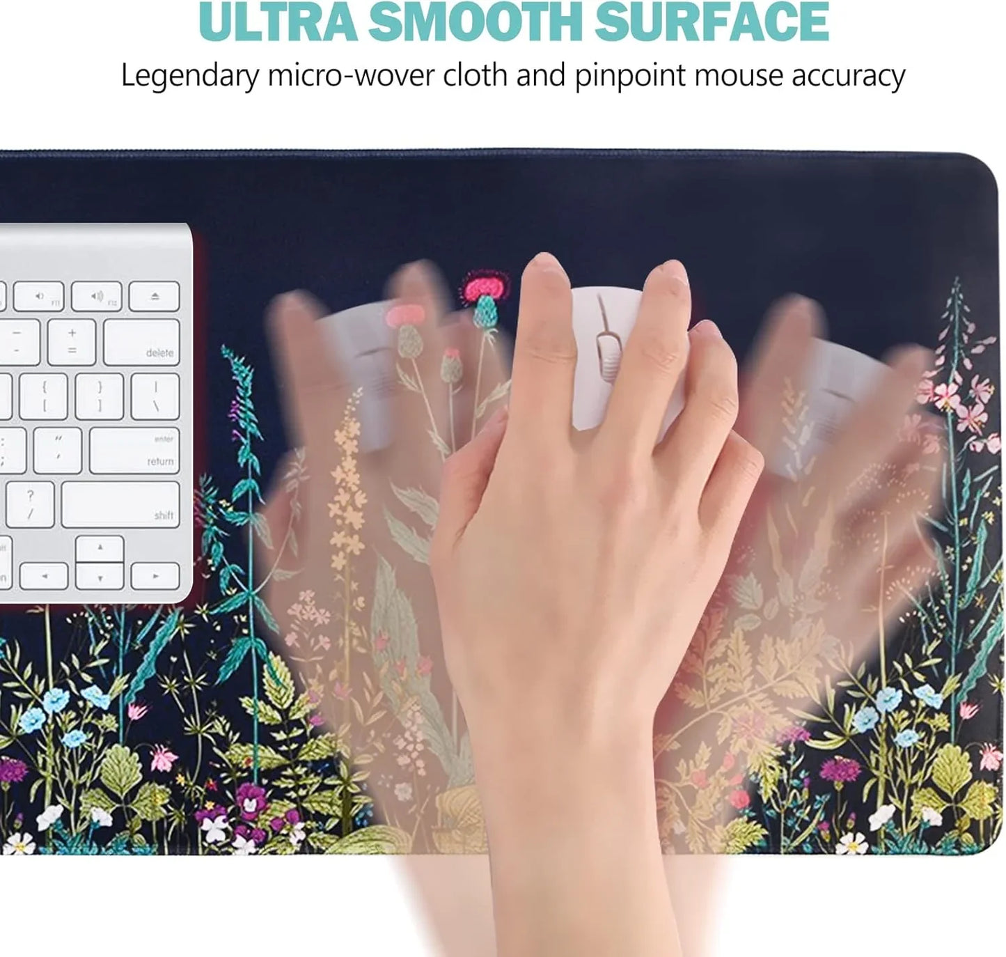 Top view of a hand moving a white mouse on a floral-patterned gaming mousepad beside a white keyboard