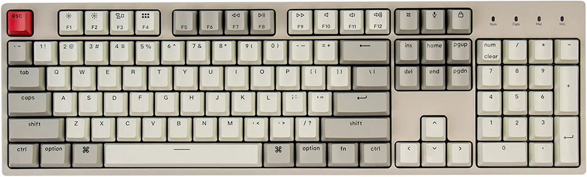 Retro 8-bit style mechanical keyboard with beige keys and a red escape key, ideal for gaming setups